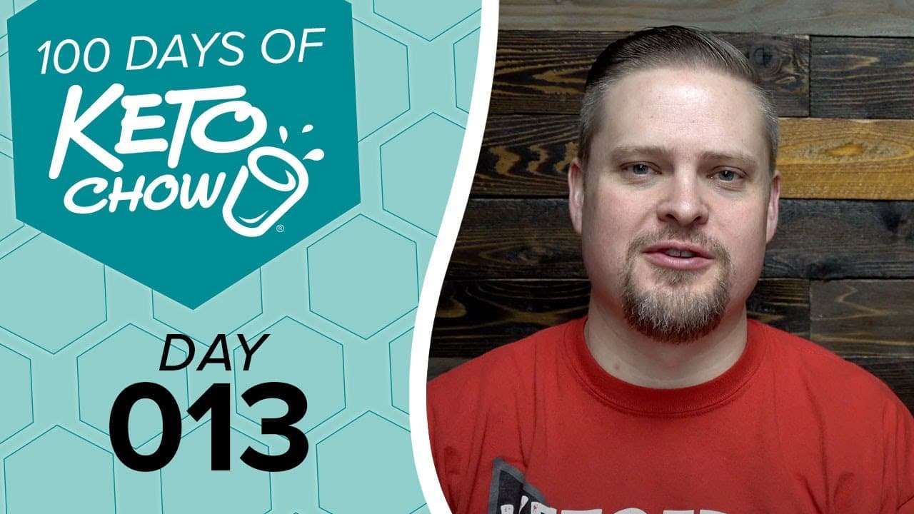 KETO CHOW text 100 DAYS OF KETO CHOW and DAY 013 on a teal and light blue hexagonal background. White cup logo with splashes.