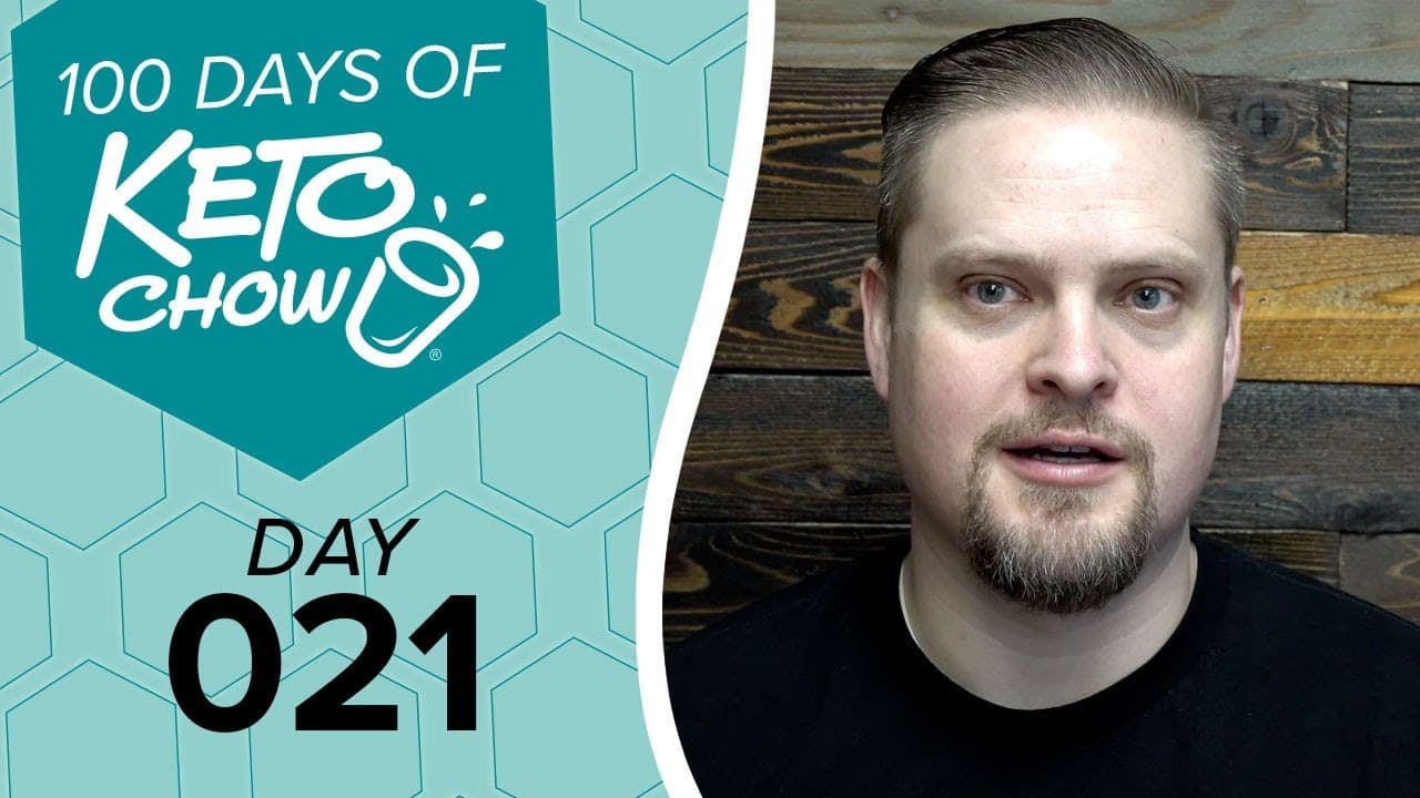 Teal and turquoise graphic with KETO CHOW logo, text 100 DAYS OF KETO CHOW and DAY 021. A man with a beard is on the right.