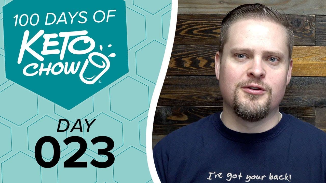 KETO CHOW 100 Days series graphic, Day 023, on a teal background with a cup logo. Man in navy shirt with I've got your back!