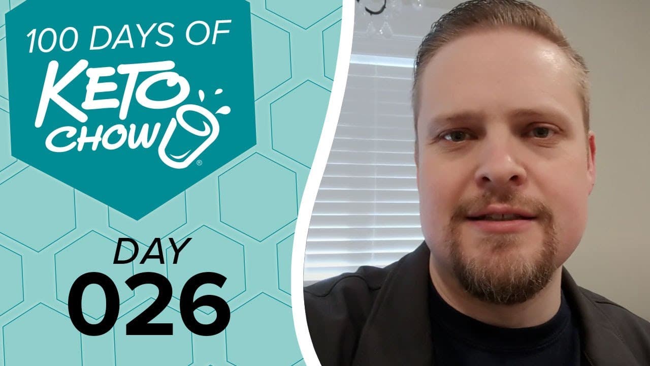 Teal graphic with white 100 DAYS OF KETO CHOW text, KETO CHOW logo, and DAY 026. A man with a beard is on the right.