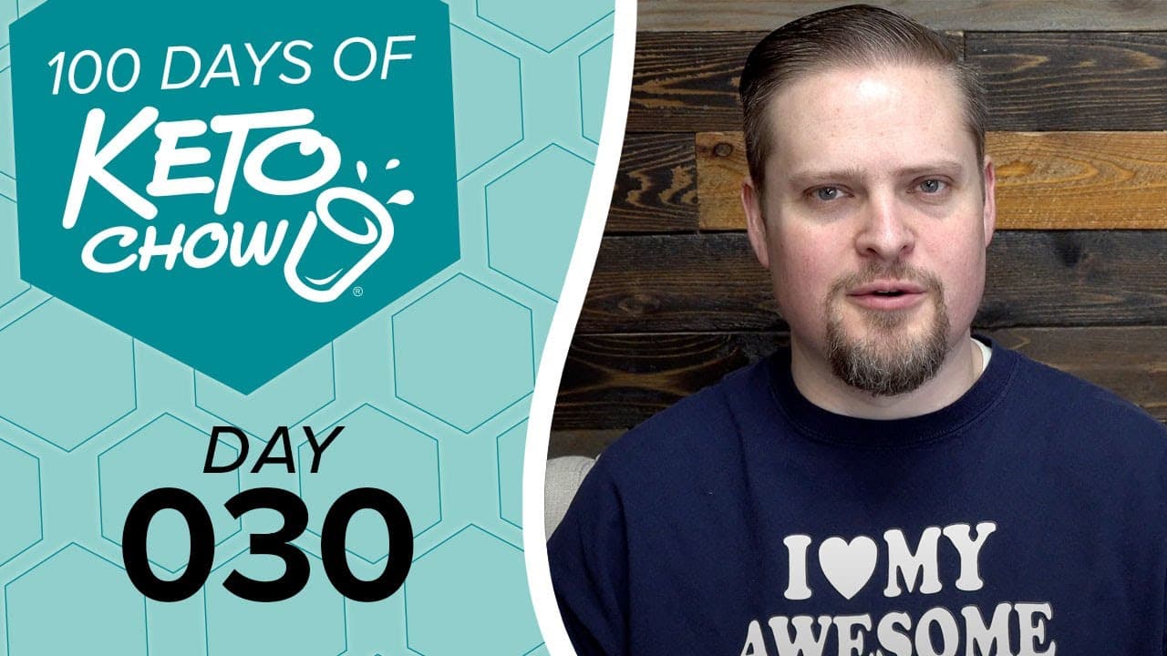 Teal and light blue graphic promoting 100 Days of Keto Chow, Day 030. A man in a navy sweatshirt with I Heart My Awesome text.