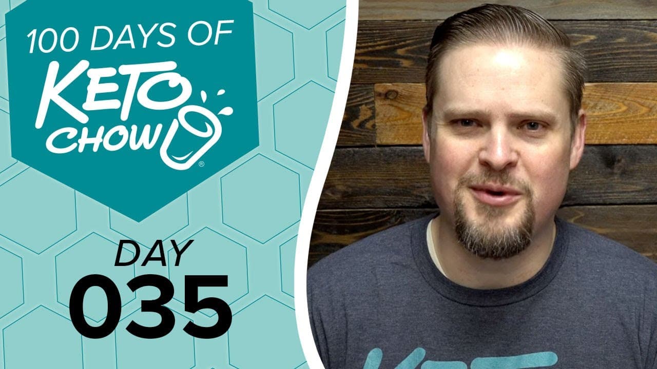 Keto Chow branding graphic: 100 DAYS OF KETO CHOW, DAY 035, and shaker logo on teal and light blue hexagon background. Man on right.