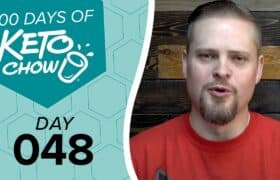 Teal and light blue graphic overlay for Keto Chow features 100 DAYS OF KETO CHOW logo and DAY 048 text, next to a man in a red shirt.