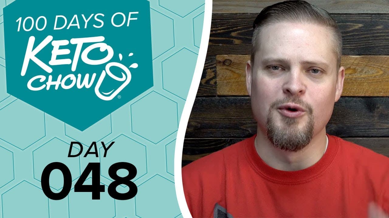 Teal and light blue graphic overlay for Keto Chow features 100 DAYS OF KETO CHOW logo and DAY 048 text, next to a man in a red shirt.