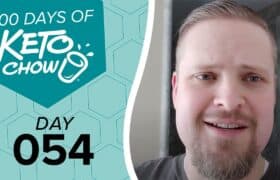 Teal graphic features KETO CHOW logo, 100 DAYS OF KETO CHOW in white, and DAY 054 in black. A man with a beard smiles on the right.