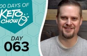 KETO CHOW brand graphic with 100 DAYS OF KETO CHOW and DAY 063 text on a teal and light blue background, beside a smiling man.