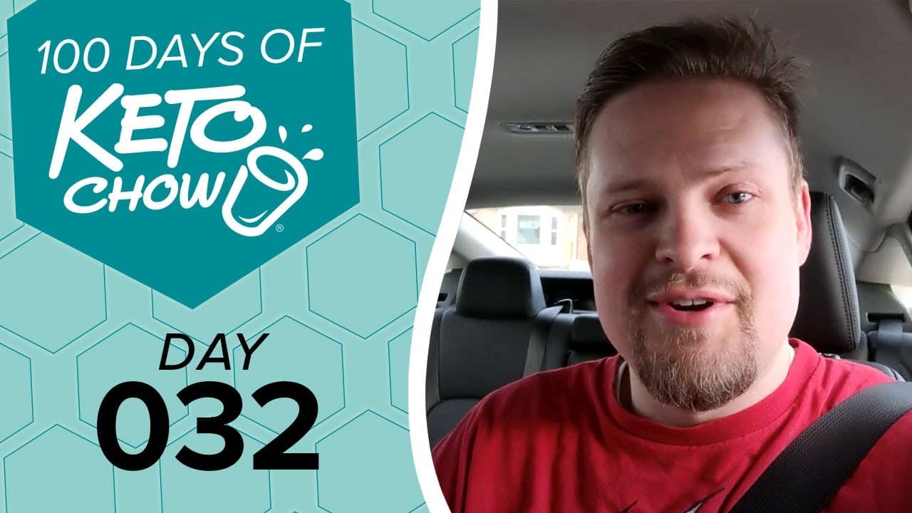 Teal graphic for 100 Days of KETO CHOW Day 032, featuring the KETO CHOW logo. Beside it, a man in a red shirt is in a car.