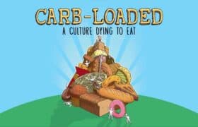 Illustration titled CARB-LOADED A CULTURE DYING TO EAT. The image features a large pile of various carbohydrate foods including bread, donuts, pasta, and pastries, on green ground under a blue sky. Small white figures are seen interacting with the food pile. The text CARB-LOADED is in yellow, and A CULTURE DYING TO EAT is in black.