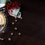 Pie plate with a partial Eggnog Cream Pie.