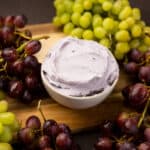 Bowl Grape Frosting, surrounded by grapes.