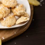 Close up - Black plate filled with Coconut Macaroons.