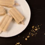 White plate with four Peanut Butter Pops.