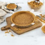 Cutting board with pie crust on it