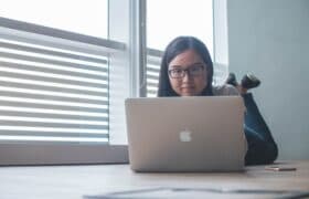 woman looking at computer
