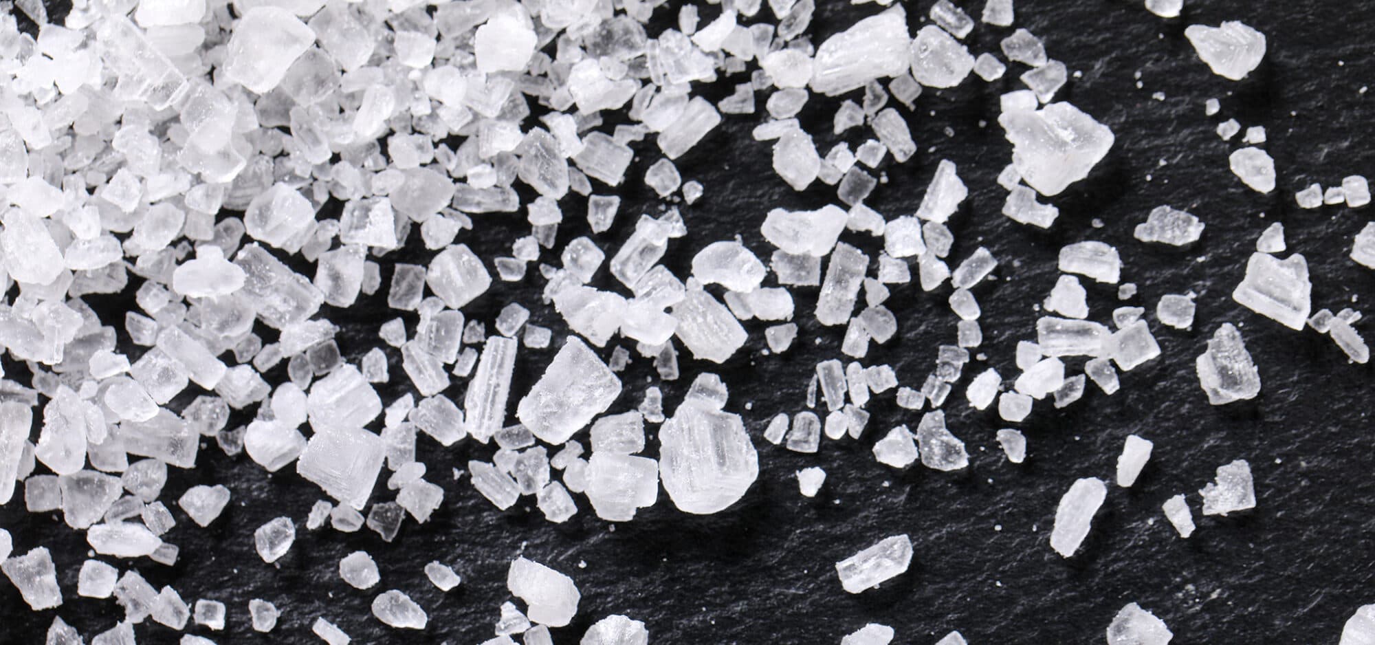 grains of salt on a black background