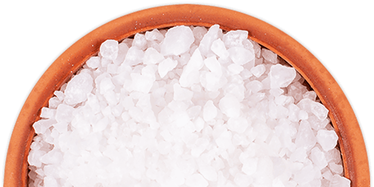 A bowl of salt on a gradient background