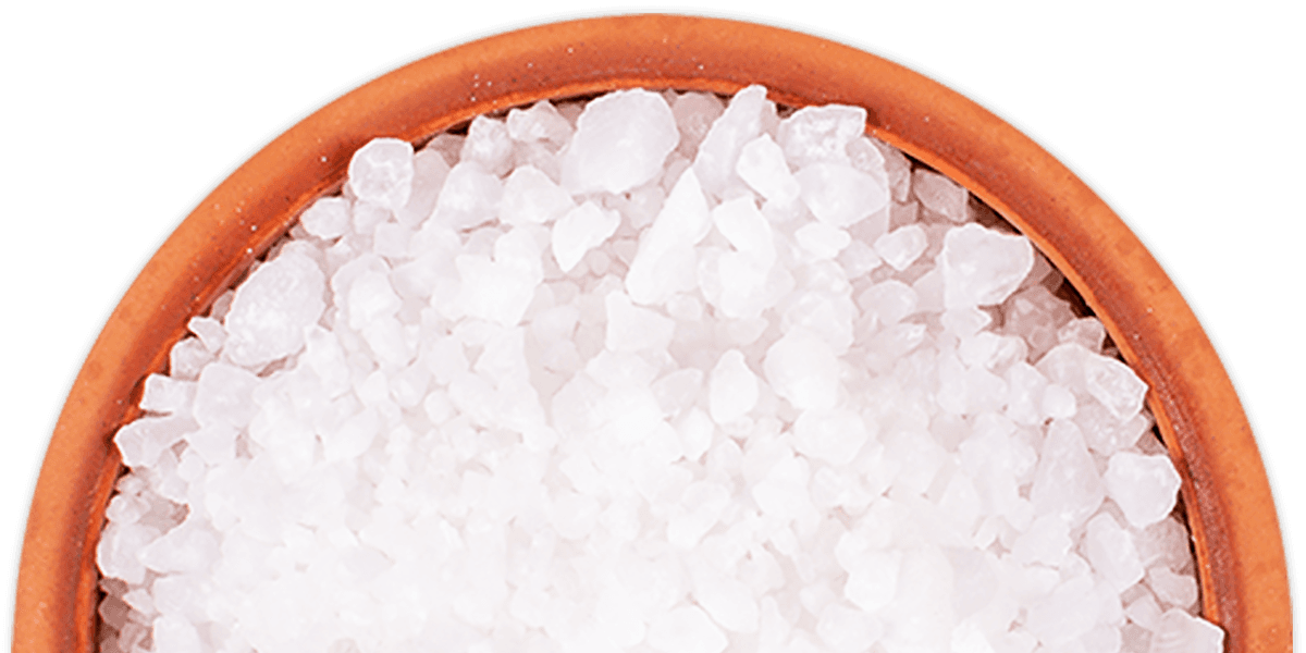 A bowl of salt on a gradient background
