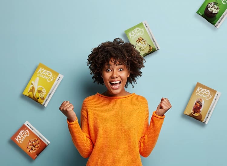 an excited woman surrounded by Keto Chow