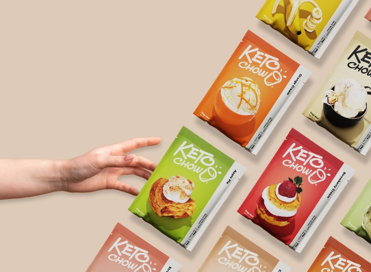 A hand reaching for packets of Keto Chow