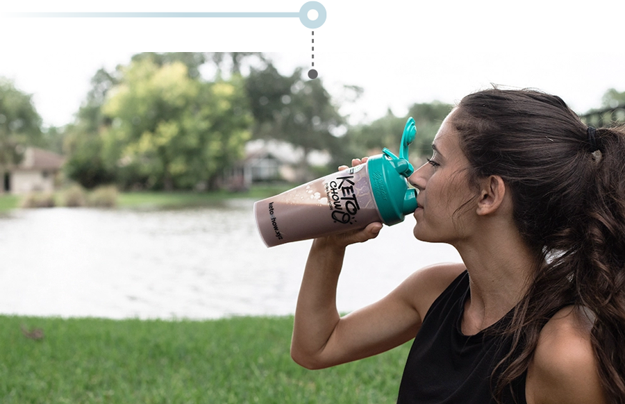 A woman drinking Keto Chow