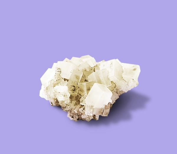 A salt crystal on a purple background