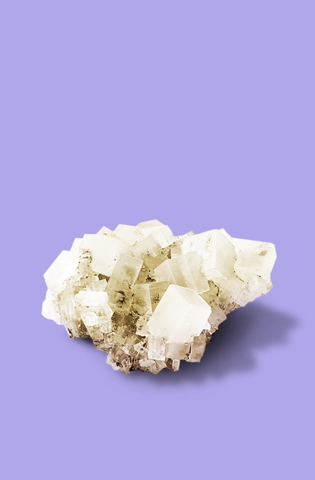 A salt crystal on a purple background