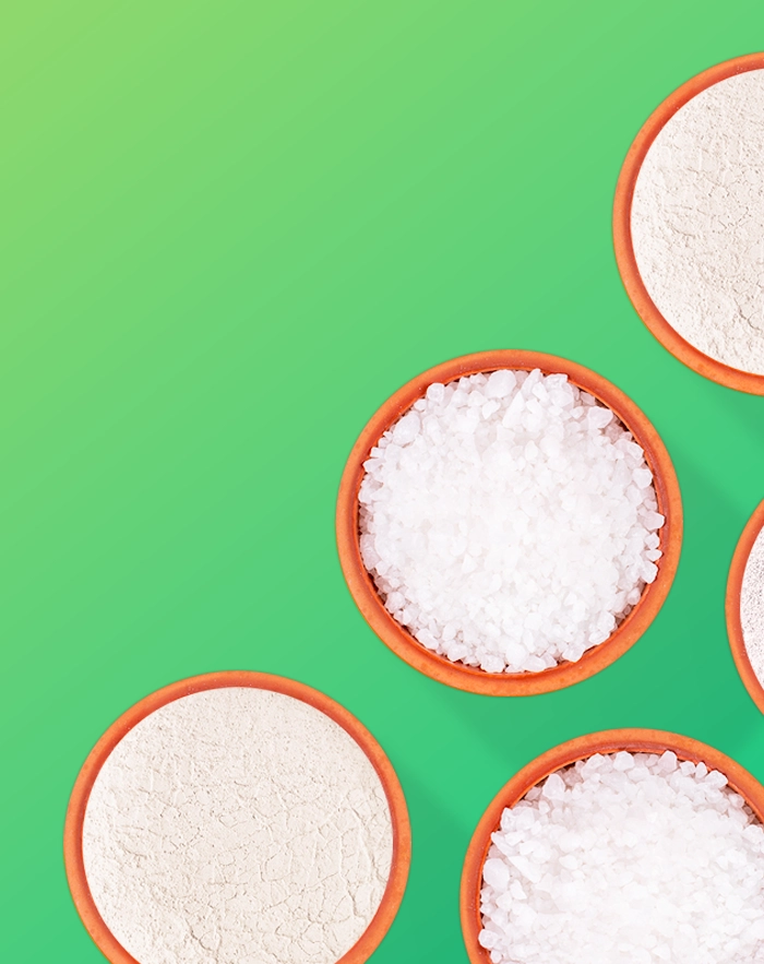 Overhead view of bowls of white granular material