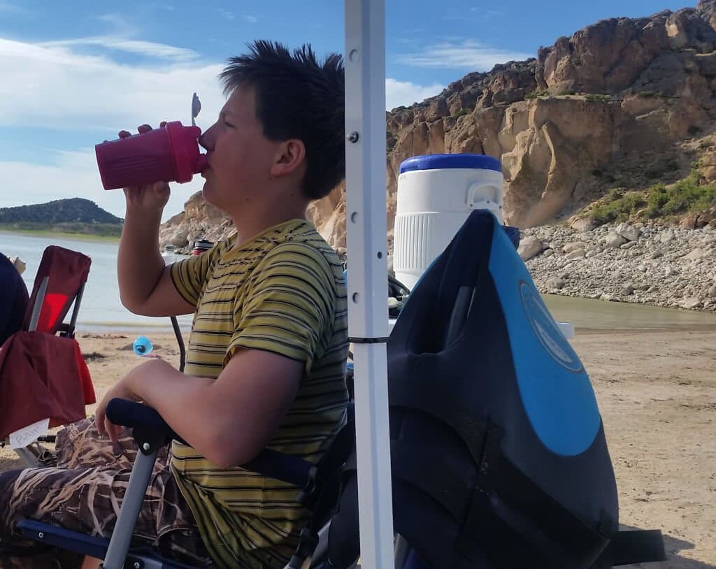 person drinking keto chow