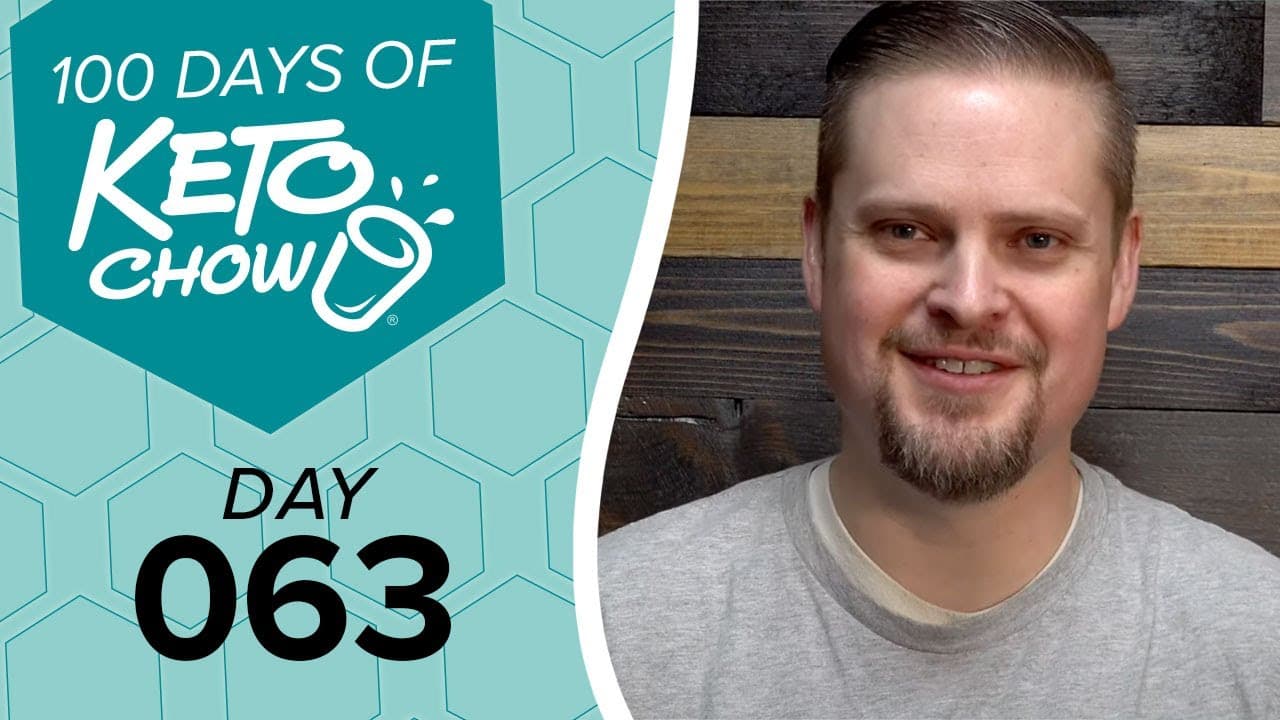 KETO CHOW brand graphic with 100 DAYS OF KETO CHOW and DAY 063 text on a teal and light blue background, beside a smiling man.