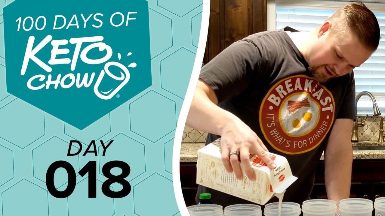 Man in a Breakfast t-shirt pouring heavy whipping cream from a white carton. Left panel shows 100 DAYS OF KETO CHOW logo on a teal background with DAY 018 text.