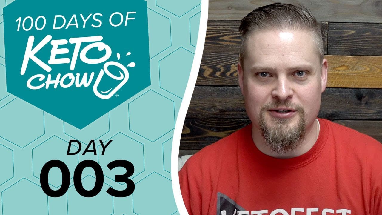 KETO CHOW logo and text 100 DAYS OF KETO CHOW on a teal hexagonal graphic, with DAY 003 below. A man in a red shirt appears on the right.