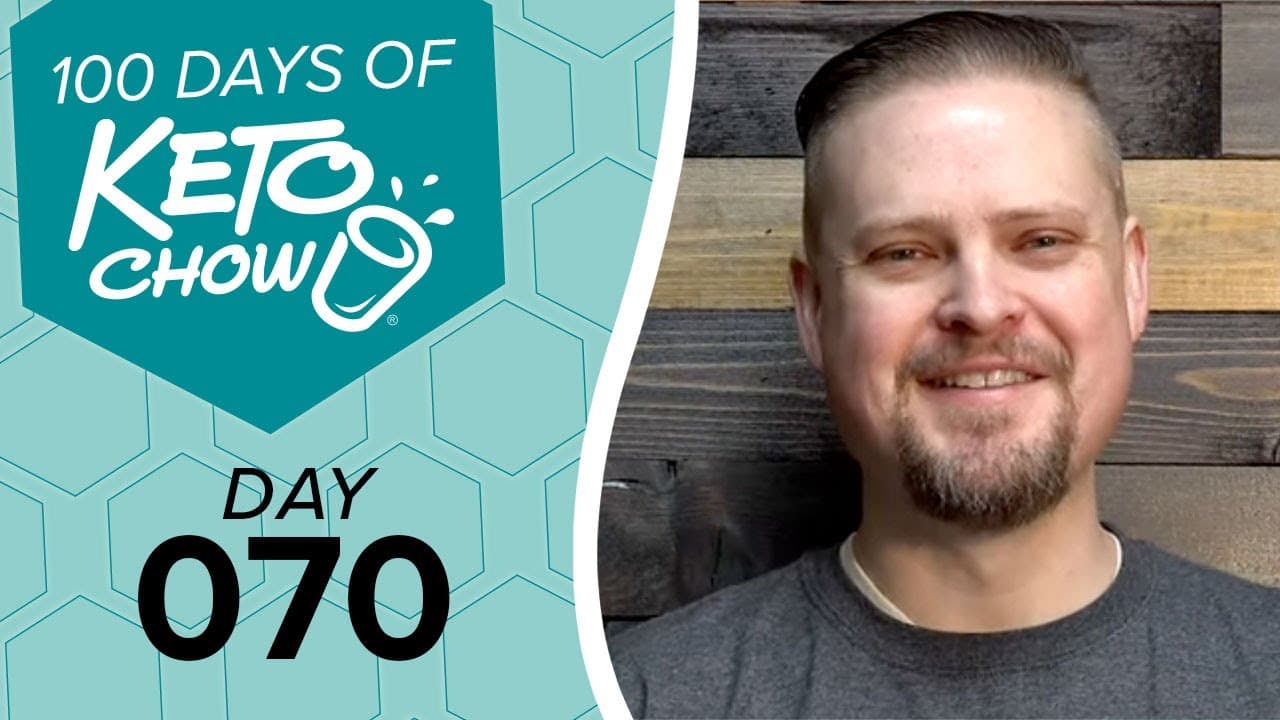 KETO CHOW logo and text 100 DAYS OF KETO CHOW DAY 070 on a teal hexagonal background. A smiling man is on the right.