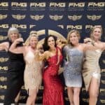 Natalie with friends at a red carpet event