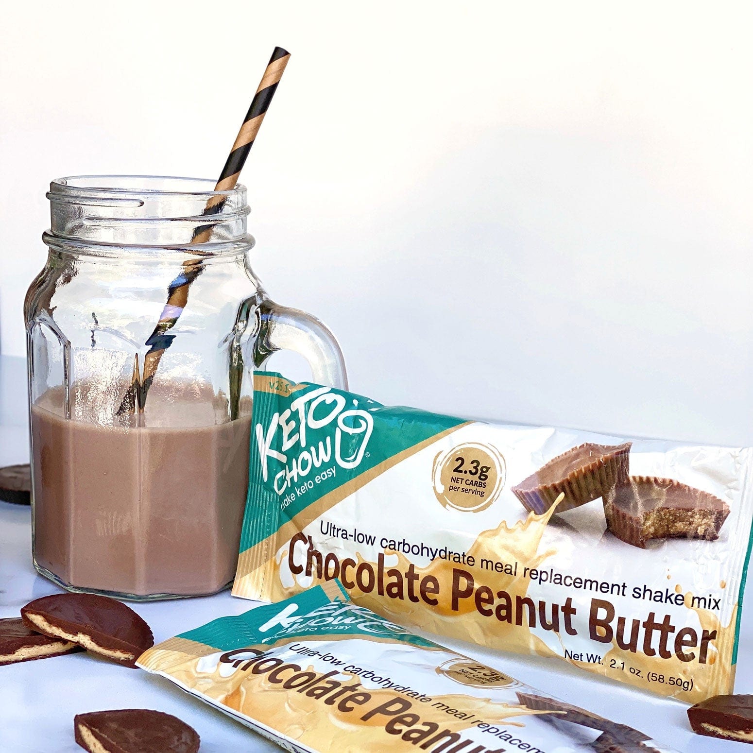 Chocolate Peanut butter keto chow shake and single meal packet with peanut butter chocolate cookies